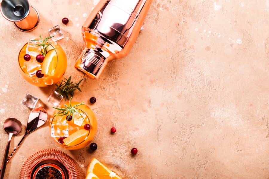 Orange, cranberry, rosemary, and vodka cocktails