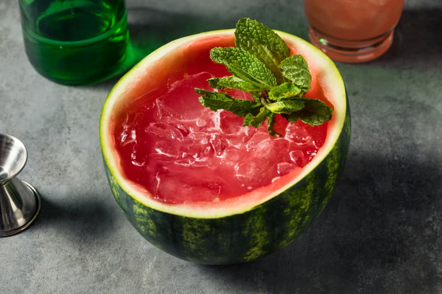 Unique soju cocktail inside hollowed out watermelon 